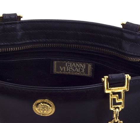 versace pouch on chain|authentic Versace purses.